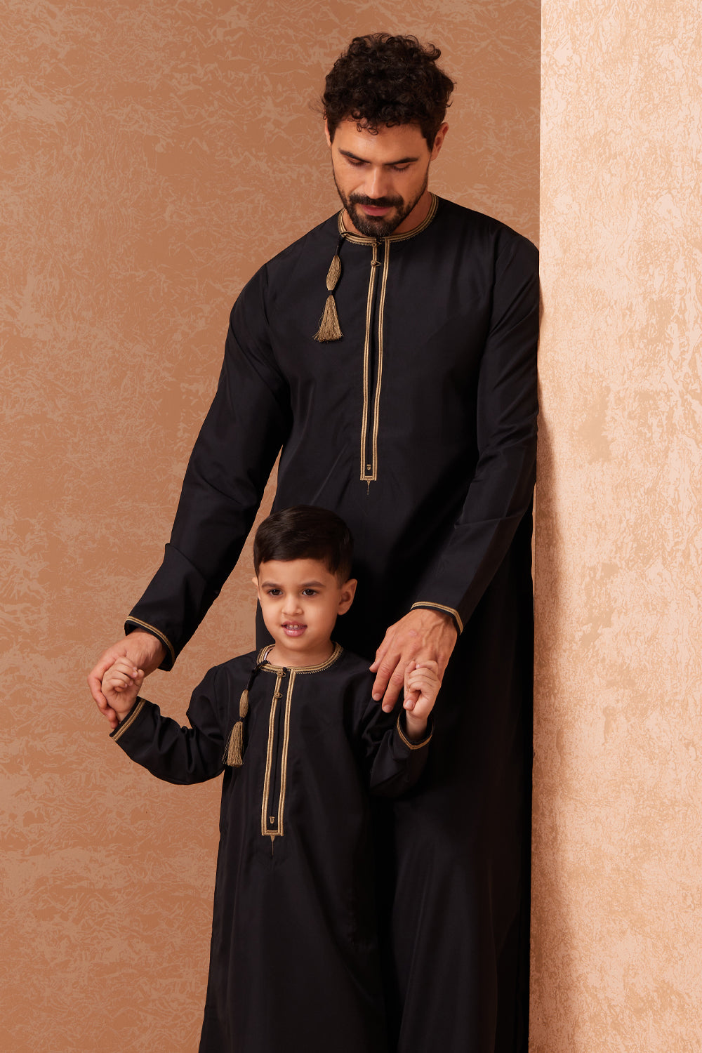 Omani black and gold duo