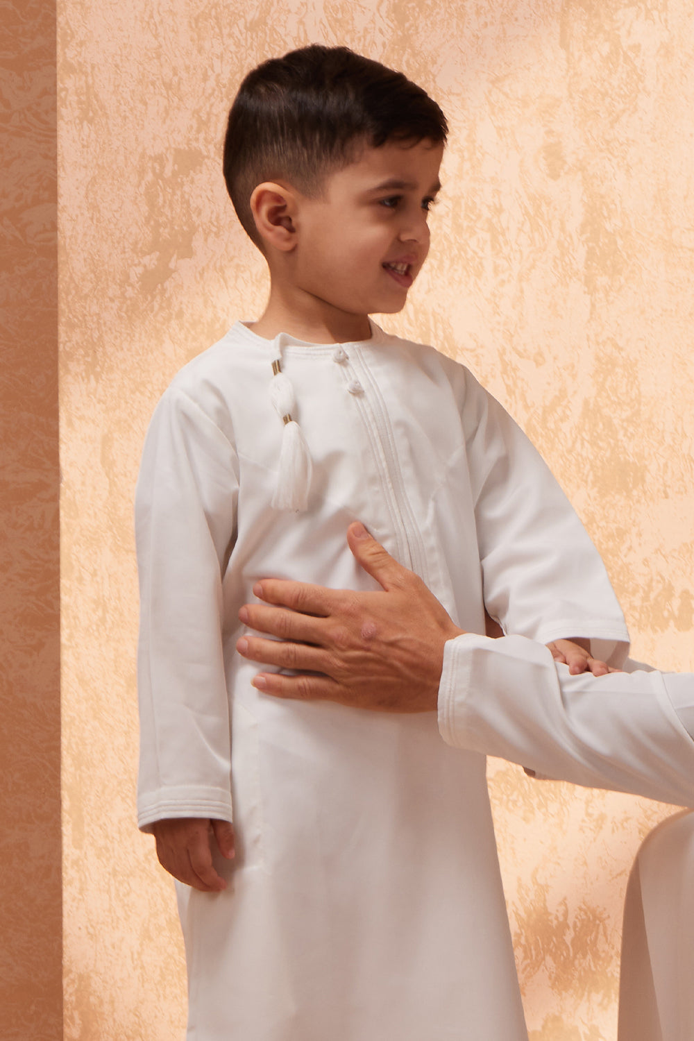 white and gold omani kids