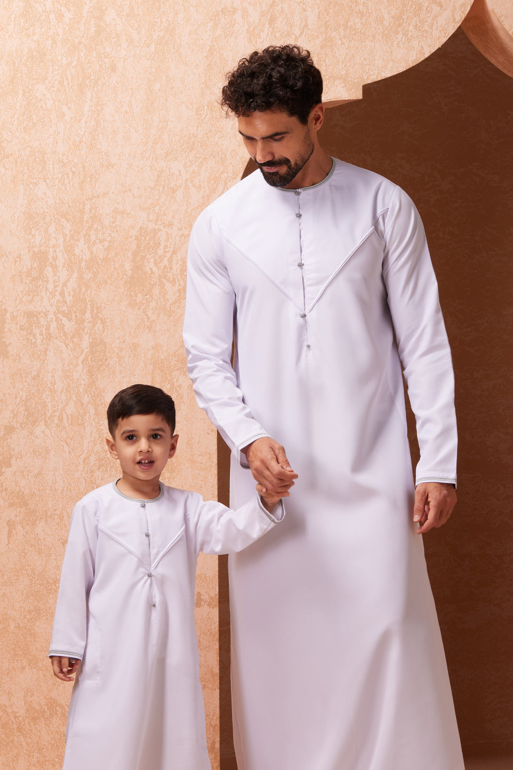 white and silver emirati duo