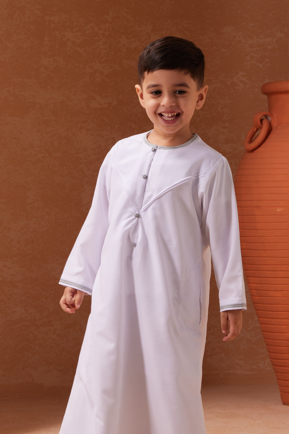 white and silver emirati kids